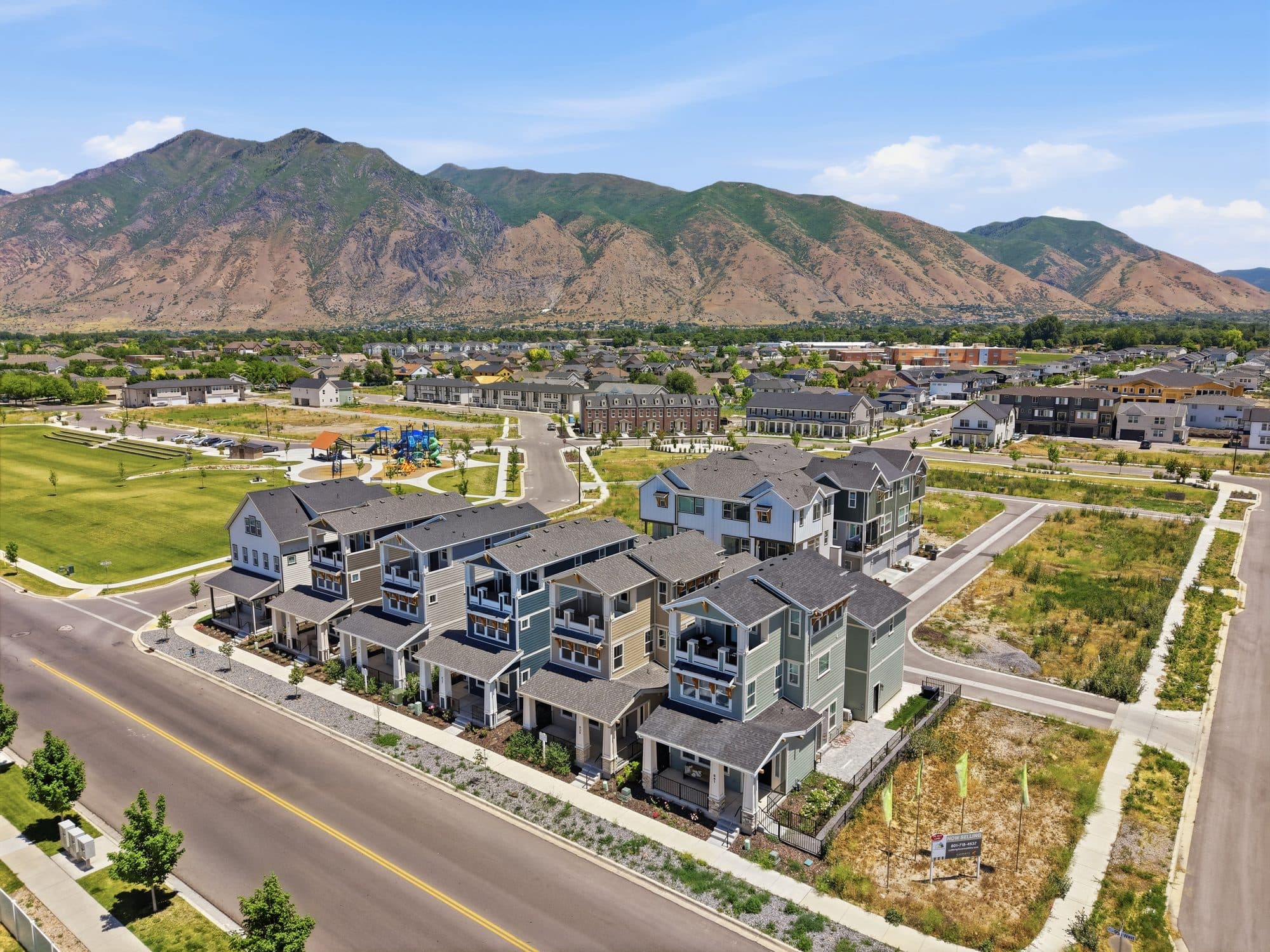 Aerial view of Iron Oak homes at Huntington Ranch, framed by the Wasatch mountains.