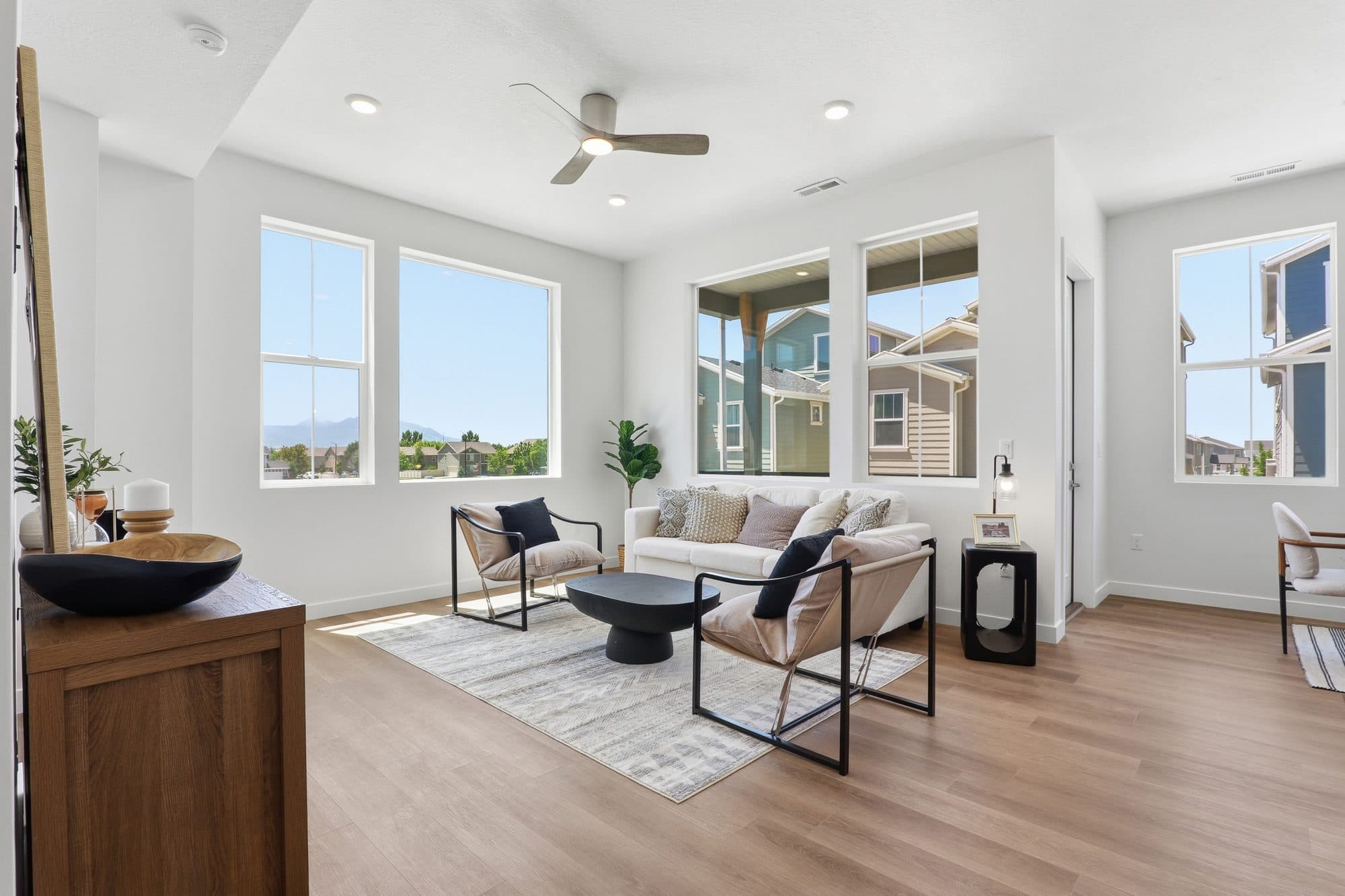 The living room of a Lofts twin home at 896 W Huntington River Dr.