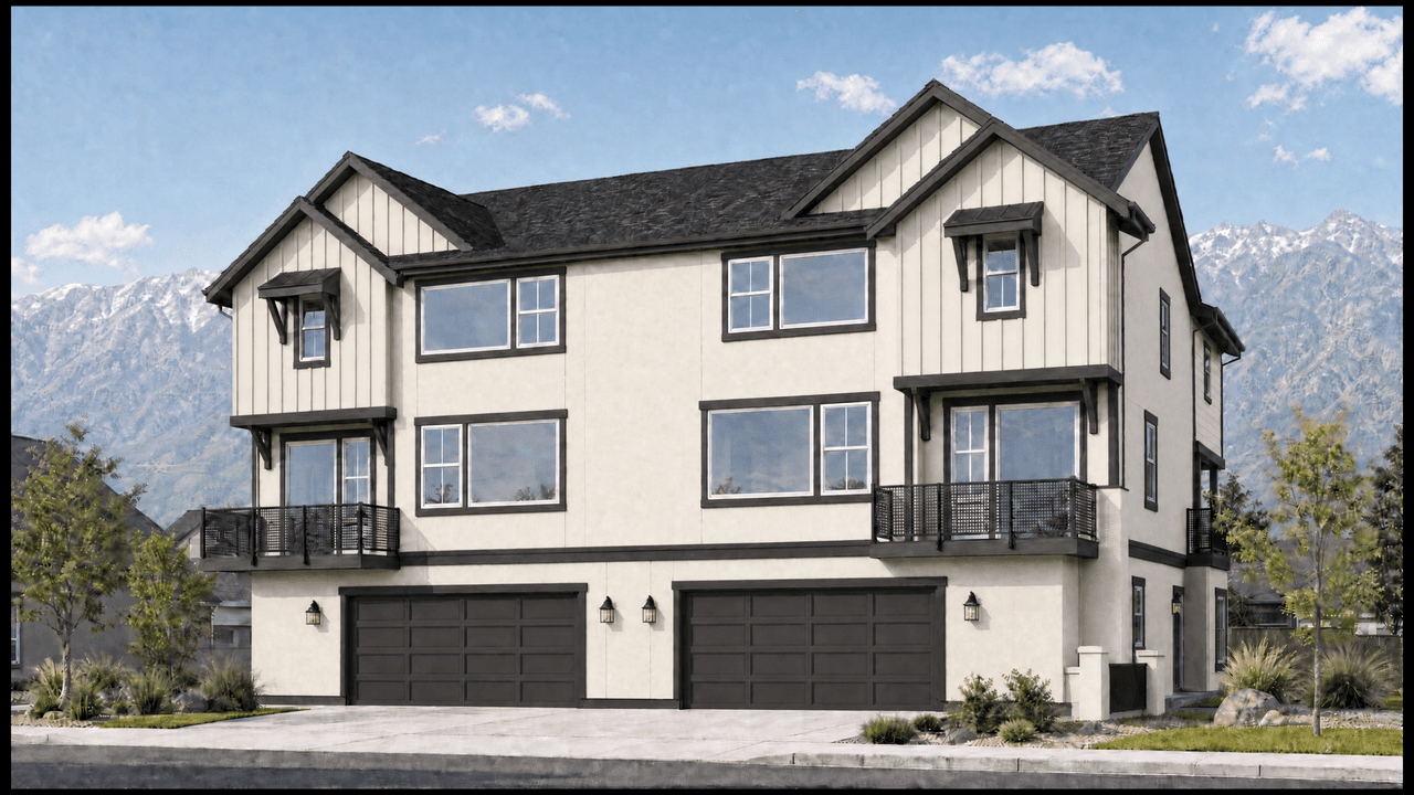The Lofts Twin Attached, a paired two-home building in cream board-and-batten with twin garages.
